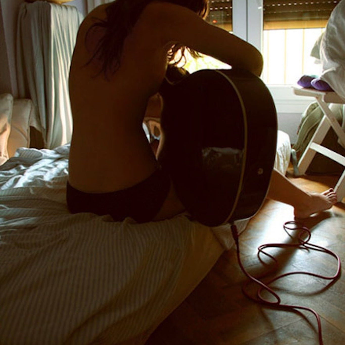 She Wasn’t Playing the Guitar. She Was Holding It Hostage - Château Wanton